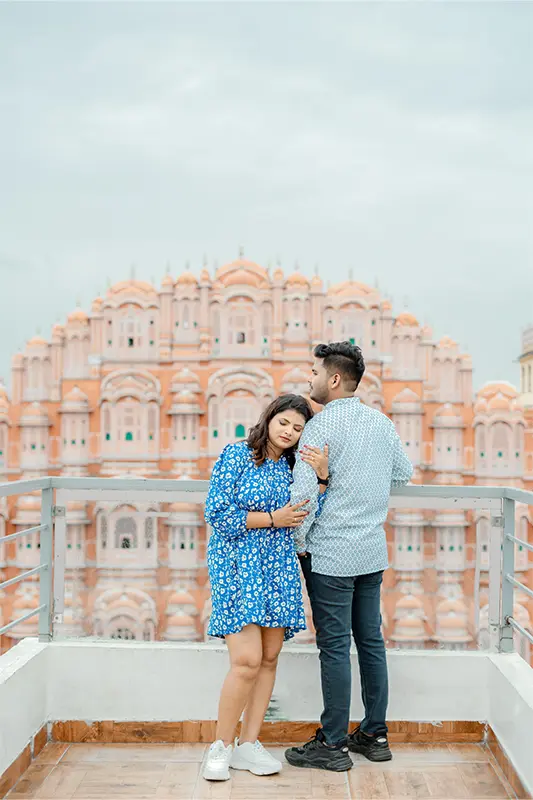 Cinematic pre-wedding shoot with Hawa Mahal background from front cafe terrace